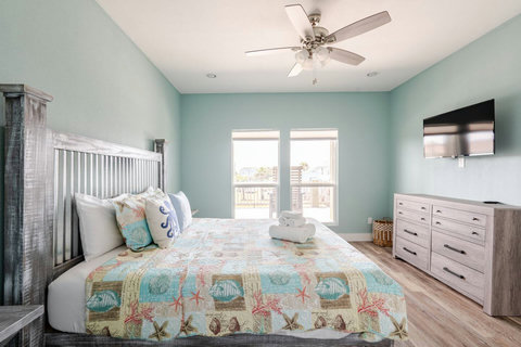 King bedroom with a smart TV