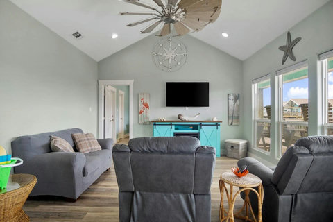Living room with a smart TV and electric fireplace