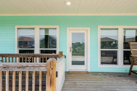 Front door off the covered deck