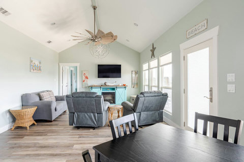 Living room with recliners and a sofa