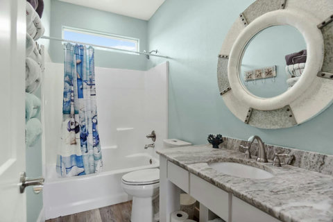 Tub-shower with coastal curtain