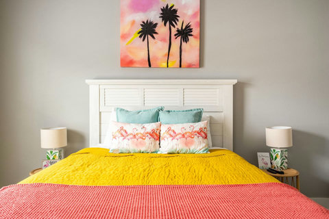 Bed with flamingo pillows