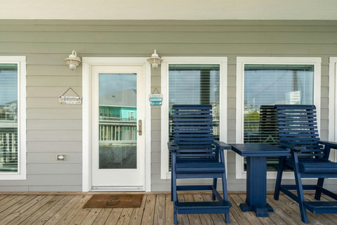 Front door off the covered deck