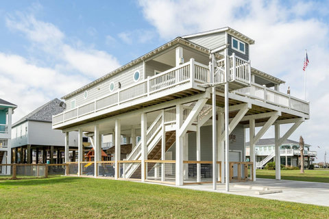 Raised beach house with wraparound decks