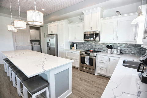 Quartz counters and a gas range