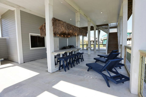 Tiki bar with bar stools
