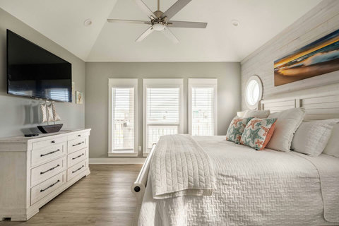 King bedroom with a smart TV