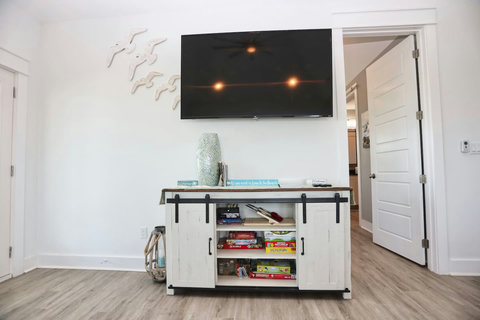 Game cabinet and TV