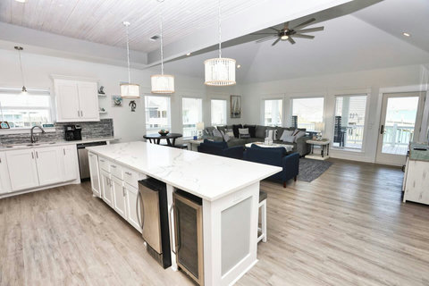 Kitchen island with the living room beyond