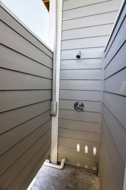 Outdoor shower to rinse off the sand