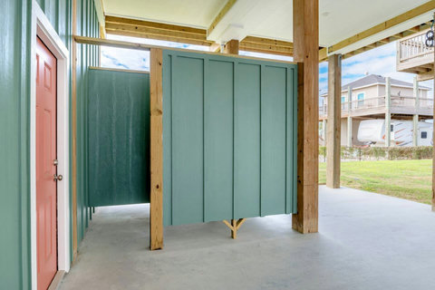 Outdoor shower under the house