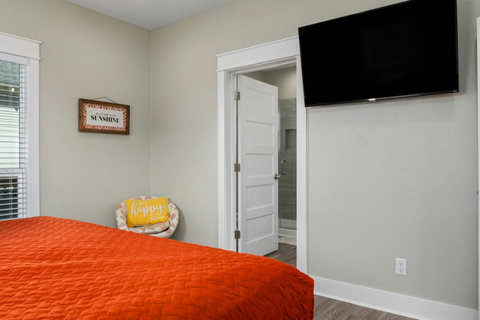 King bedroom with a TV