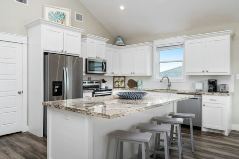 White kitchen with granite counters