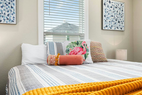Soft king bed with flamingo pillows