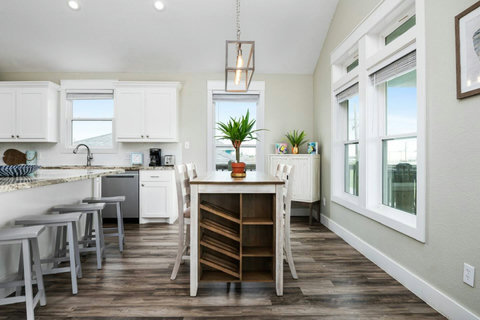 High-top dining table by the windows
