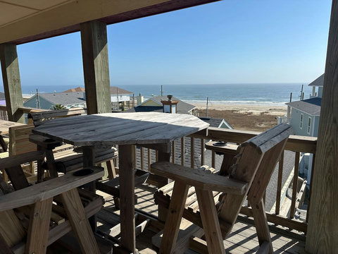 Deck dining with a view of the Gulf