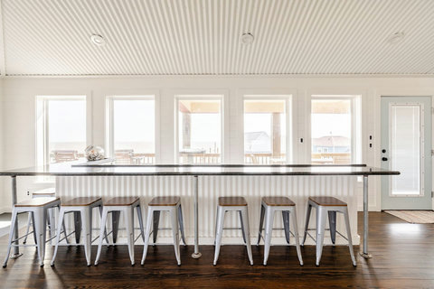 Window bar with stools and a view