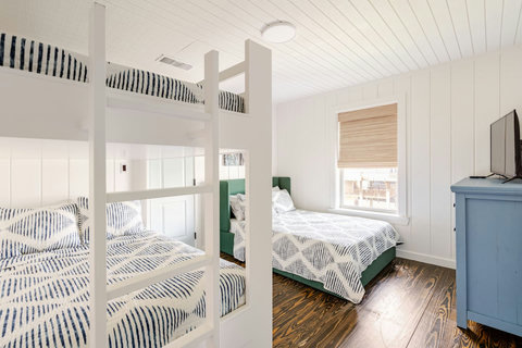 Bedroom with a full bunk and a full bed