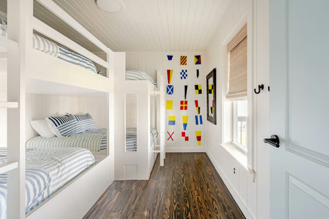 Built-in bunks with nautical flags