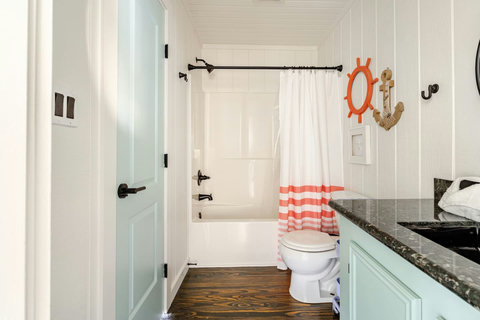 Hall bath with a tub-shower