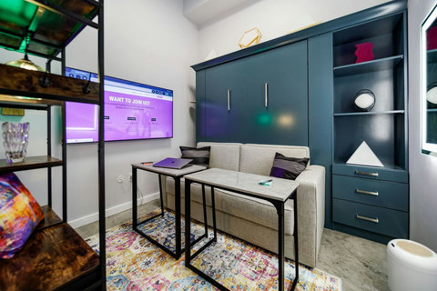 Bedroom that converts to a sitting room or office