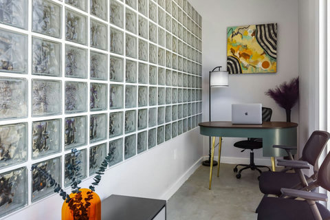 Desk with a glass block wall for working