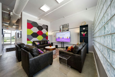 Leather chairs and accent wall