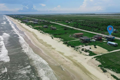 Aerial view of the shoreline and the house's location