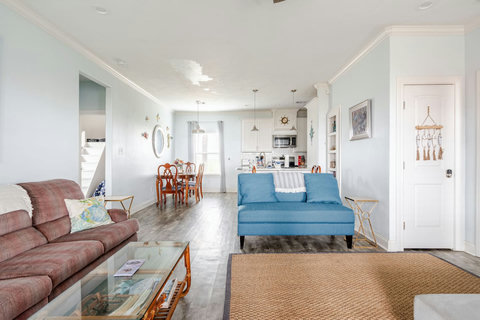 Open living room flows into the dining area and kitchen
