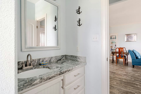 Hall bath vanity with granite counters