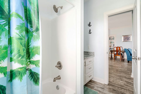 Hall bath with a tub and shower combo