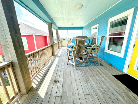 Deck seating just outside the front door
