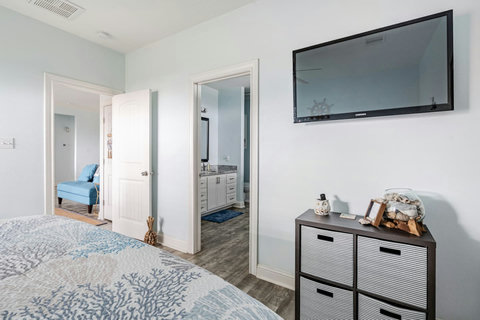 Primary bedroom opens to its own bath