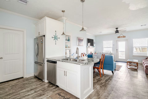 Kitchen island looks out over the living room