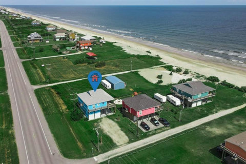Aerial view: the house sits just steps from the beach