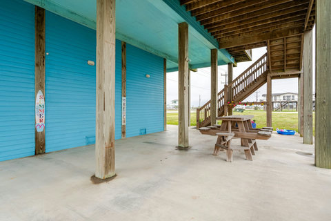 Covered patio with a picnic table for lunch in the shade