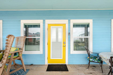 Front door opens right onto the covered deck