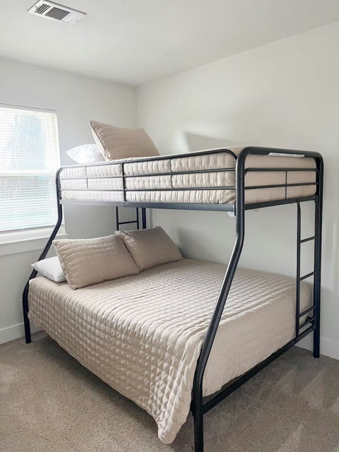 Bunk room with a twin-over-full bunk