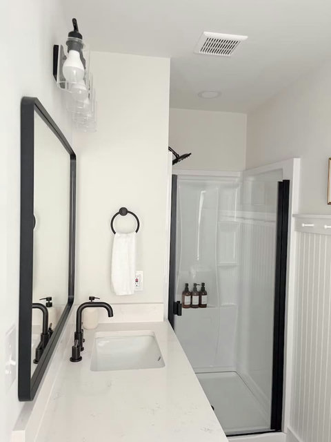 Bath with a glass shower
