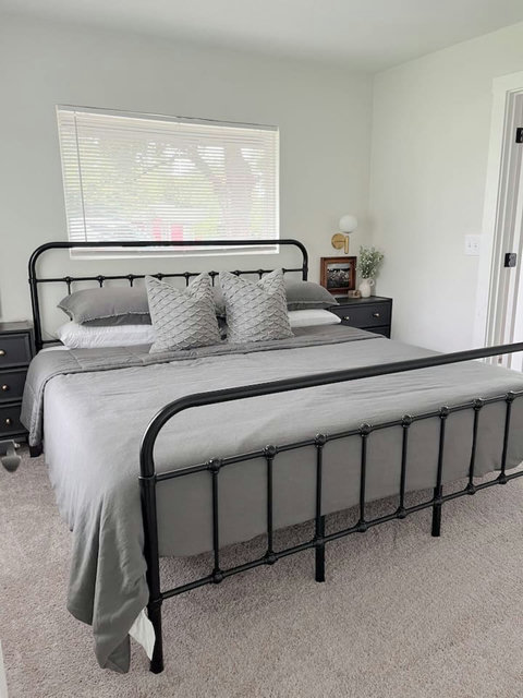 King bedroom with a window