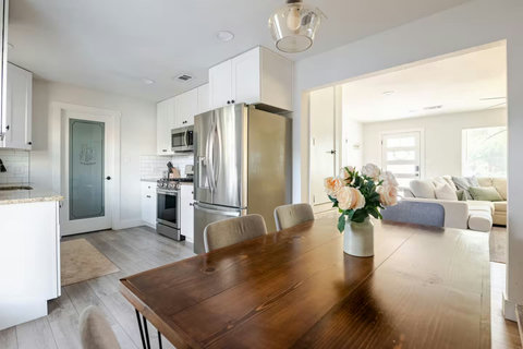 Dining table with a view into the living room