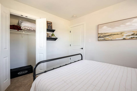 Bedroom with a closet and shelves