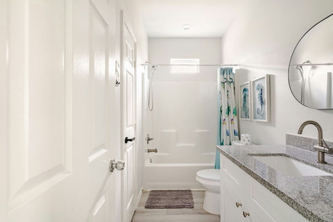 Hall bath with a tub-shower