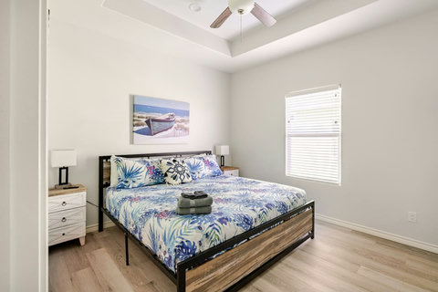 Second king bedroom with tropical bedding