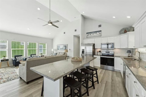 Kitchen island with the living room beyond