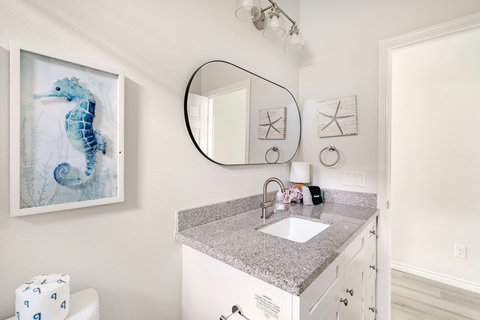 Bath vanity with a seahorse print