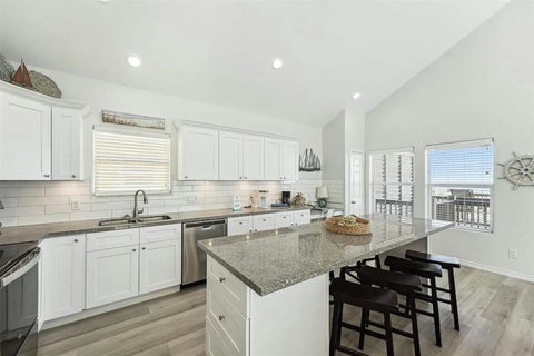 Granite island with bar stools