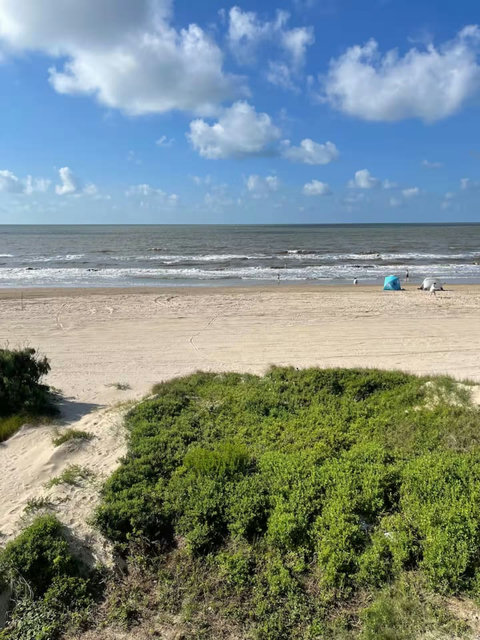 Sand and surf from the deck