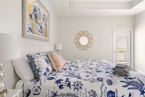 King bed with nautical bedding
