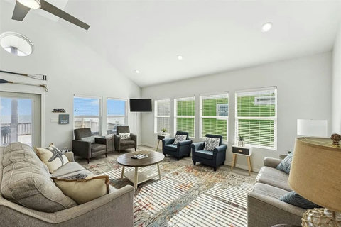 Living room with windows on three sides